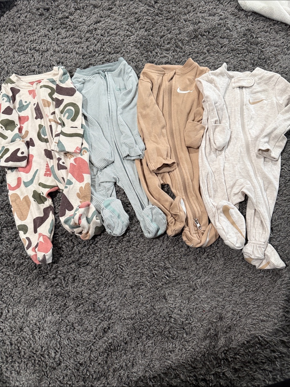 Nike Kids Footed One-Piece Pajama Set in Beige, Tan, Mint, and Multicolor Print